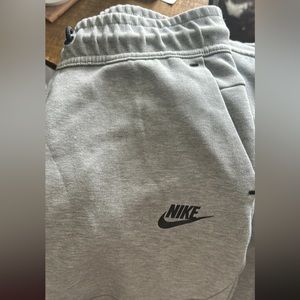 Size Large Boys Nike TECH gray matching set.